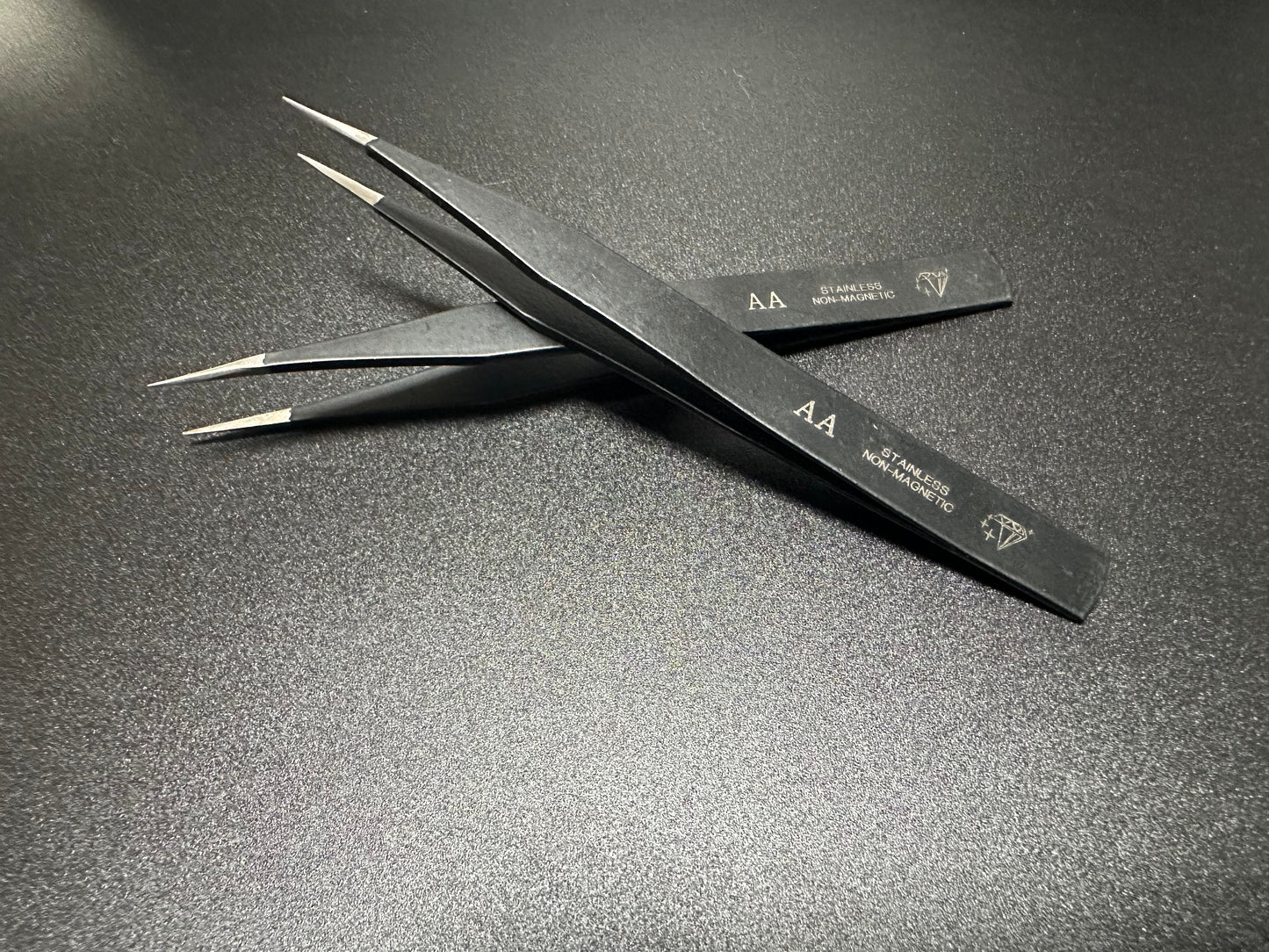 AA Tweezers. Black. Stainless Steel Non Magnetic.